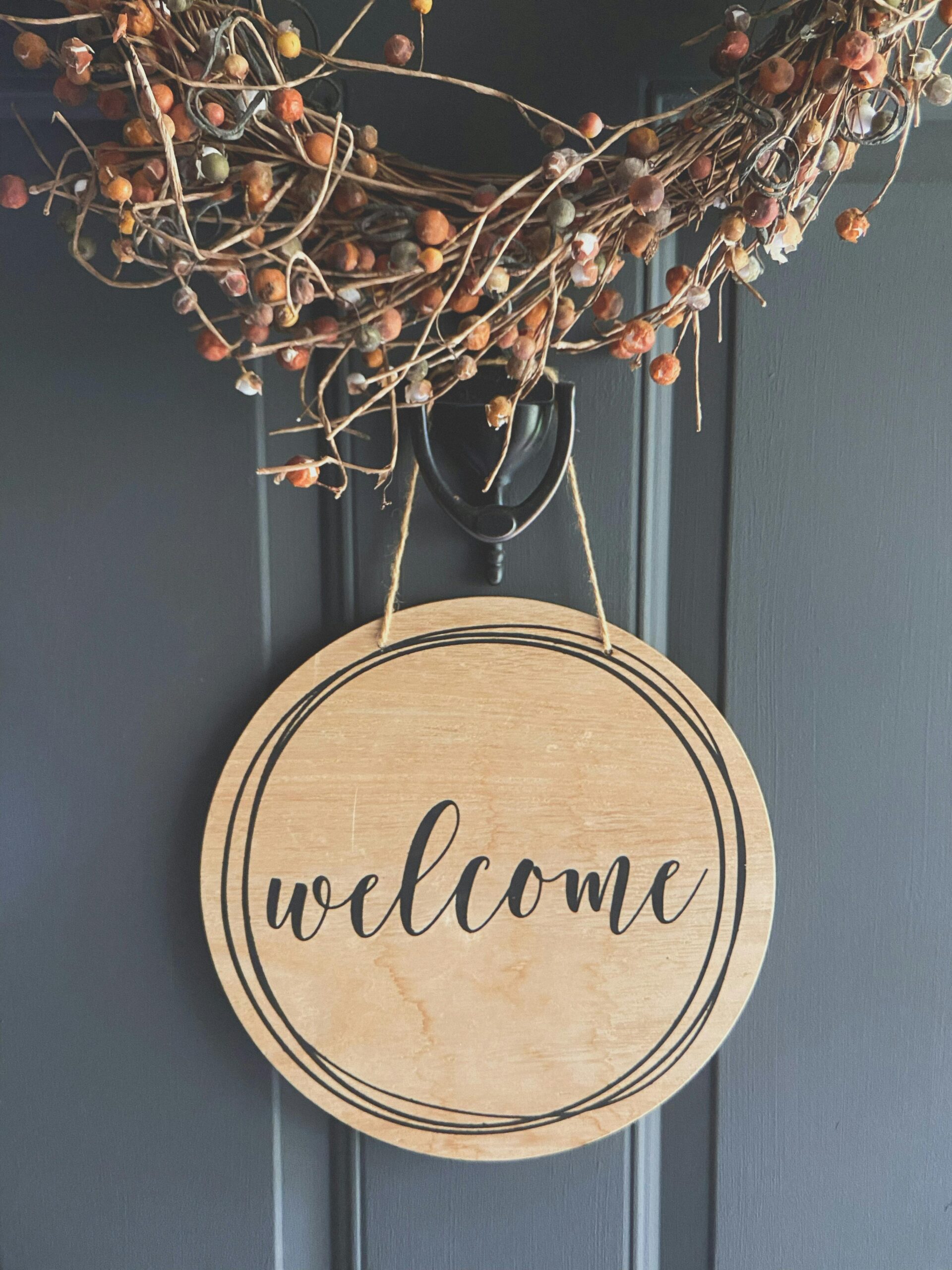 winter wreath with welcome sign