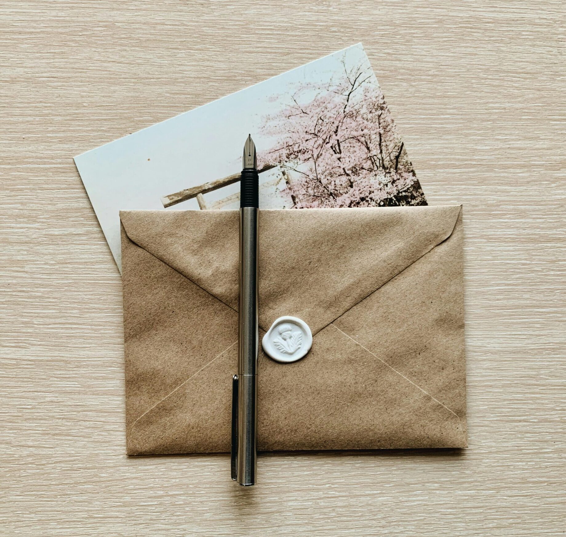 brown paper envelope with elegant card